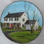 house painted on a plate