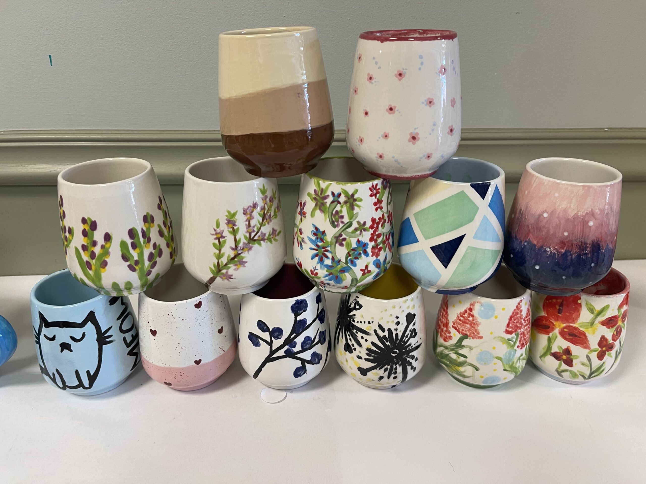 Creative team building activities Westchester NY with pottery painting and personalized charm jewelry