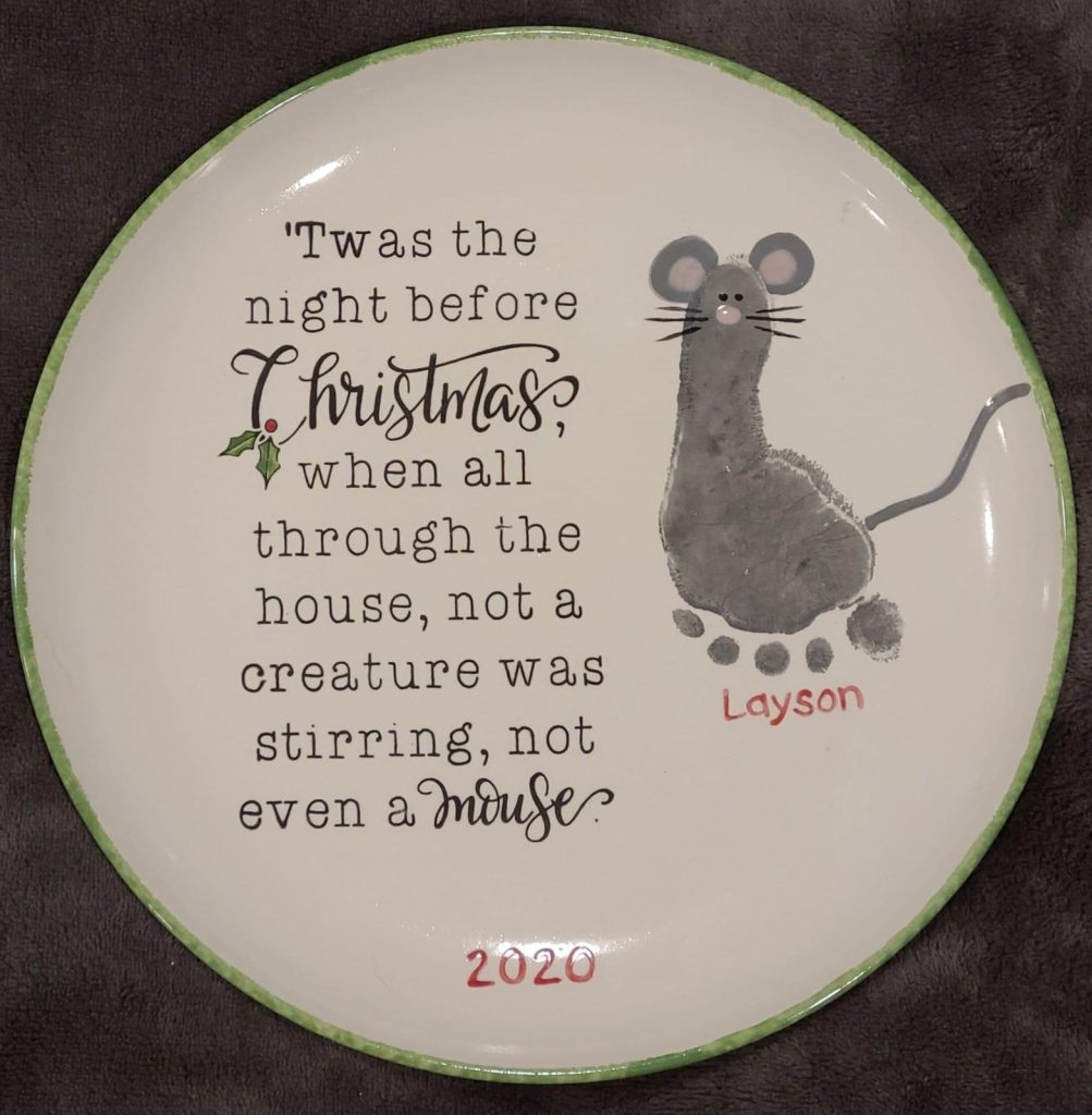 Round Christmas plate with a footprint mouse and the Twas the Night Before Christmas verse
