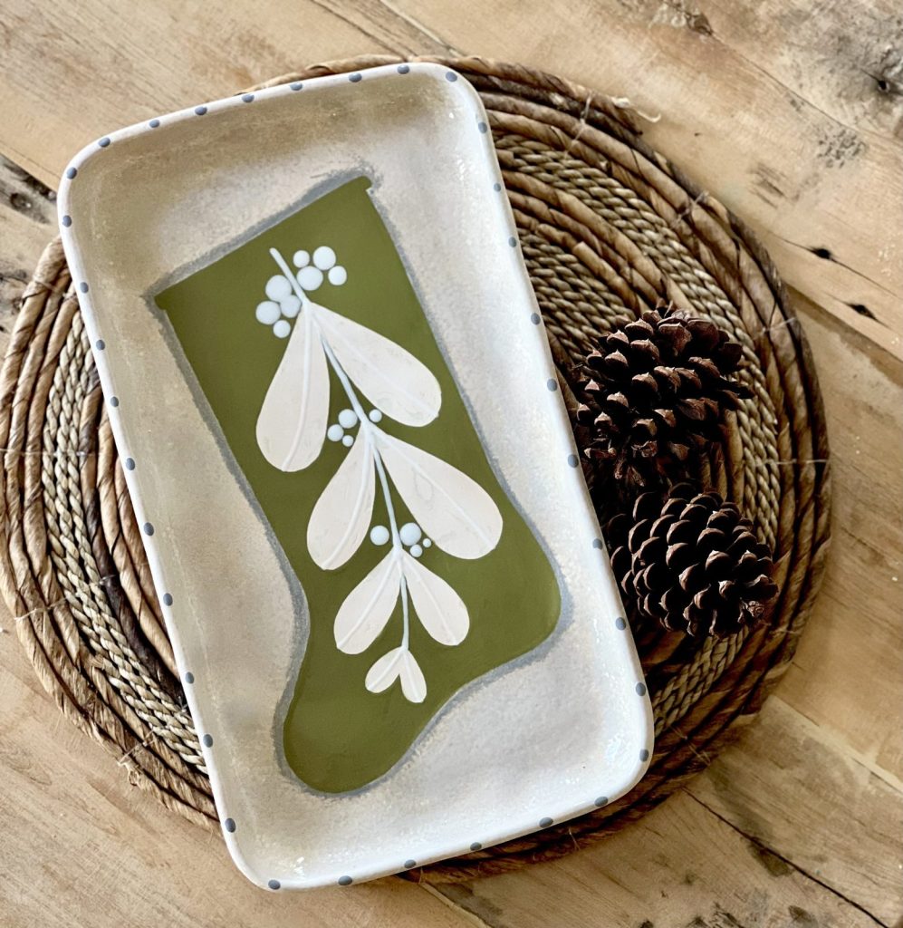 Hand-painted rectangular tray with a sage green stocking and white mistletoe design