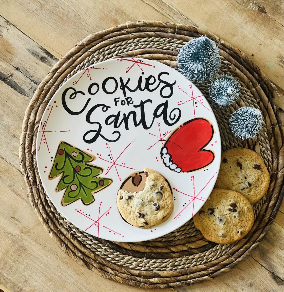 Hand-painted Cookies for Santa plate with a tree and red mitten, served with chocolate chip cookies