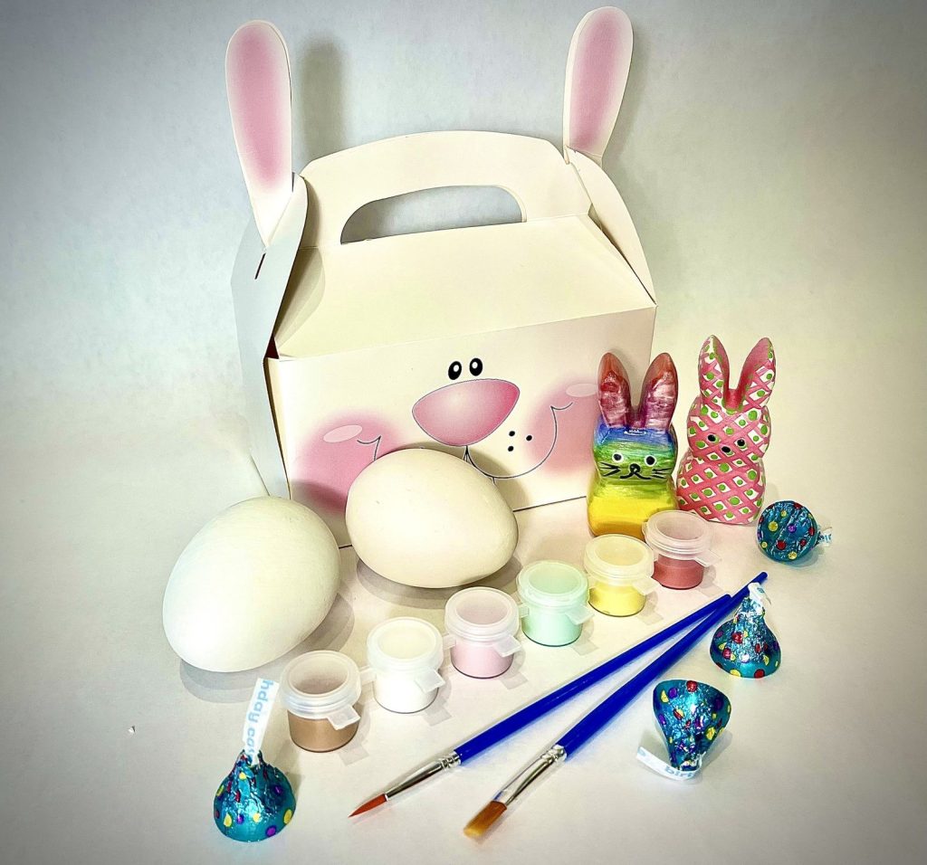 Easter paint kit with a bunny gift box, bisque eggs, painted bunnies, paint pots and brushes