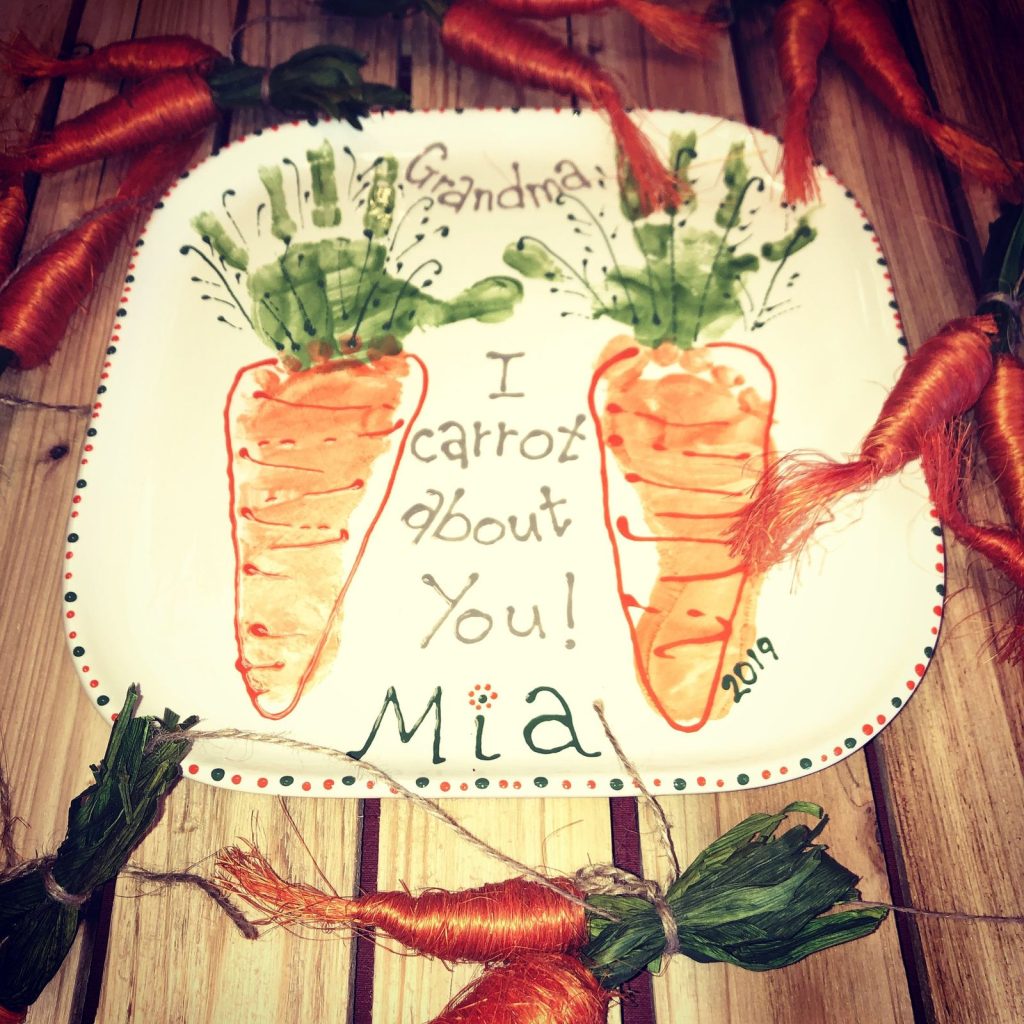 Square plate with handprint carrot tops and footprint carrots, I carrot about you
