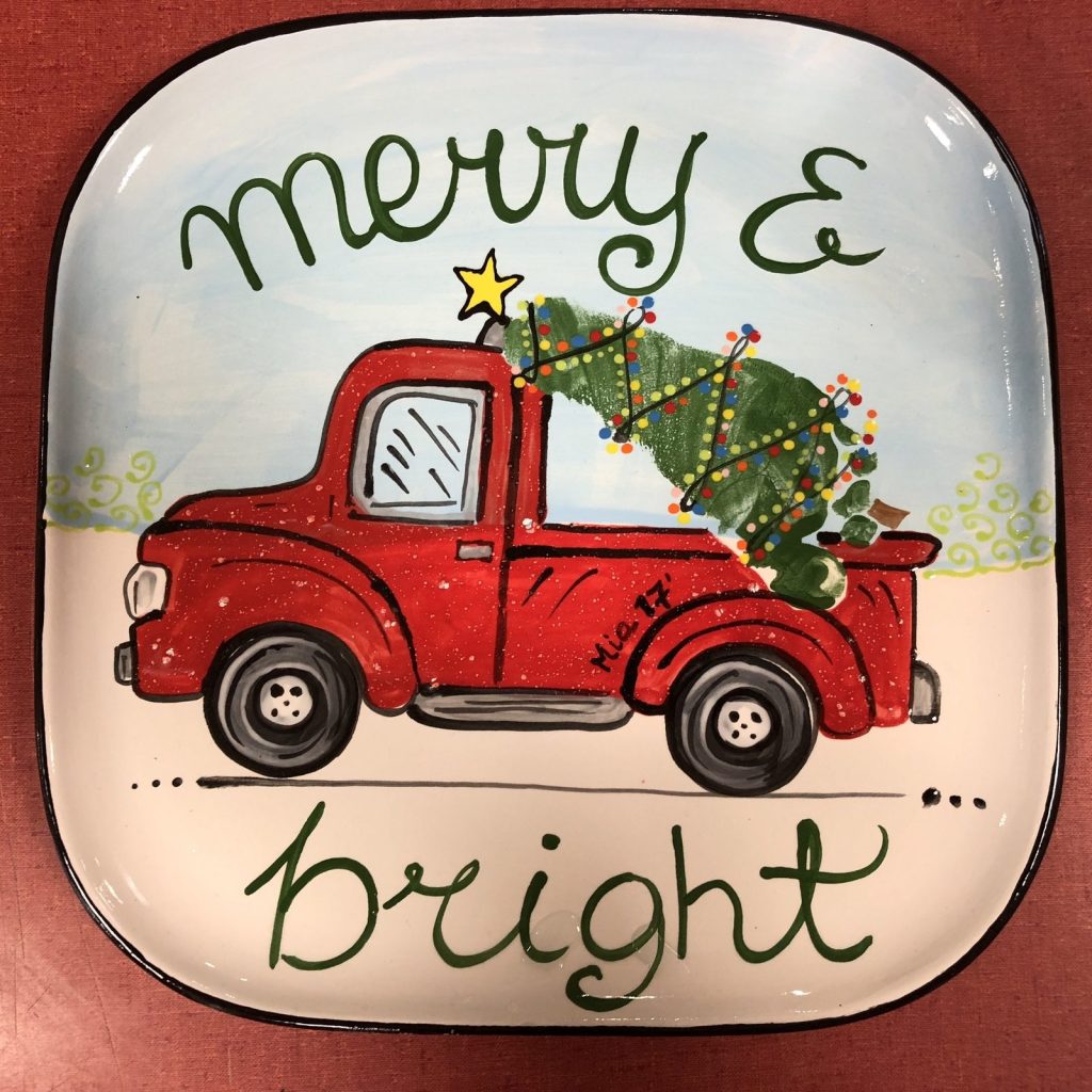 Hand-painted square Merry & Bright platter with a red pickup truck carrying a lit Christmas tree