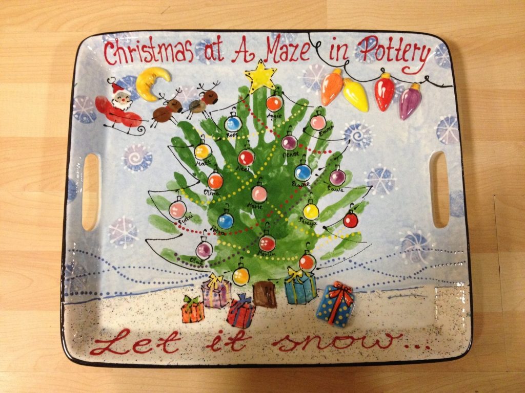 Hand-painted handled tray with a handprint Christmas tree, string lights and Let it snow lettering
