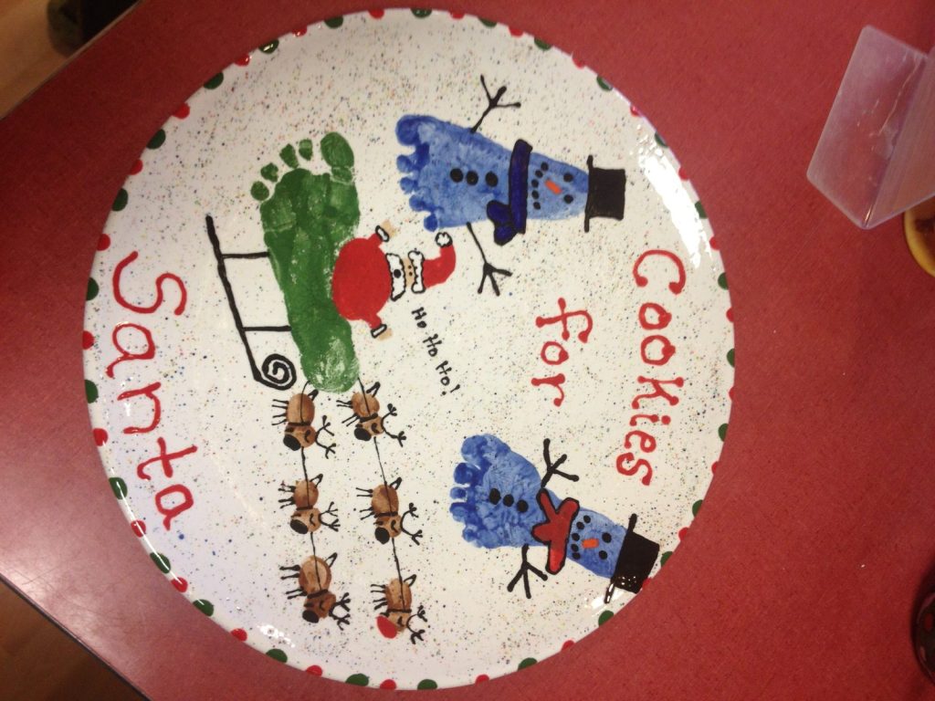 Hand-painted Cookies for Santa plate with a footprint sleigh, snowmen and fingerprint reindeer