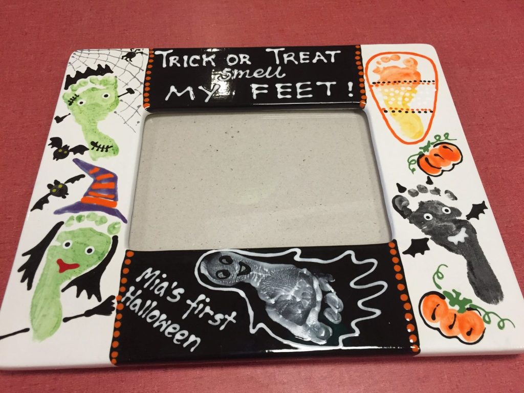 Hand-painted Trick or Treat Smell My Feet frame with footprint monster, witch and ghost