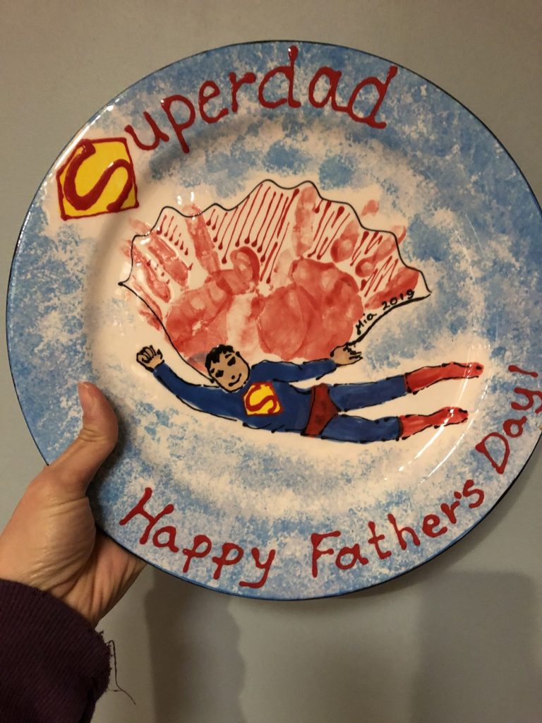 Hand-painted Superdad Happy Father's Day plate with a red handprint cape and flying superhero