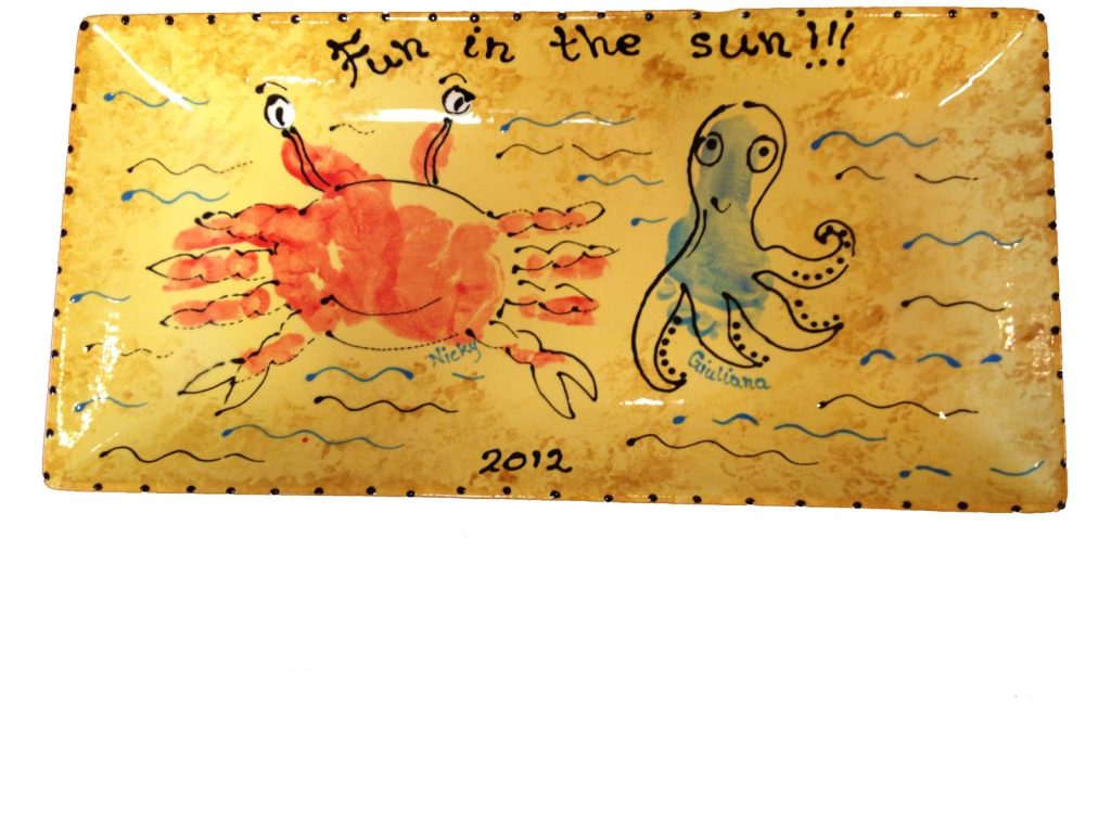 Hand-painted rectangular Fun in the sun tray with a handprint crab and octopus, dated 2012