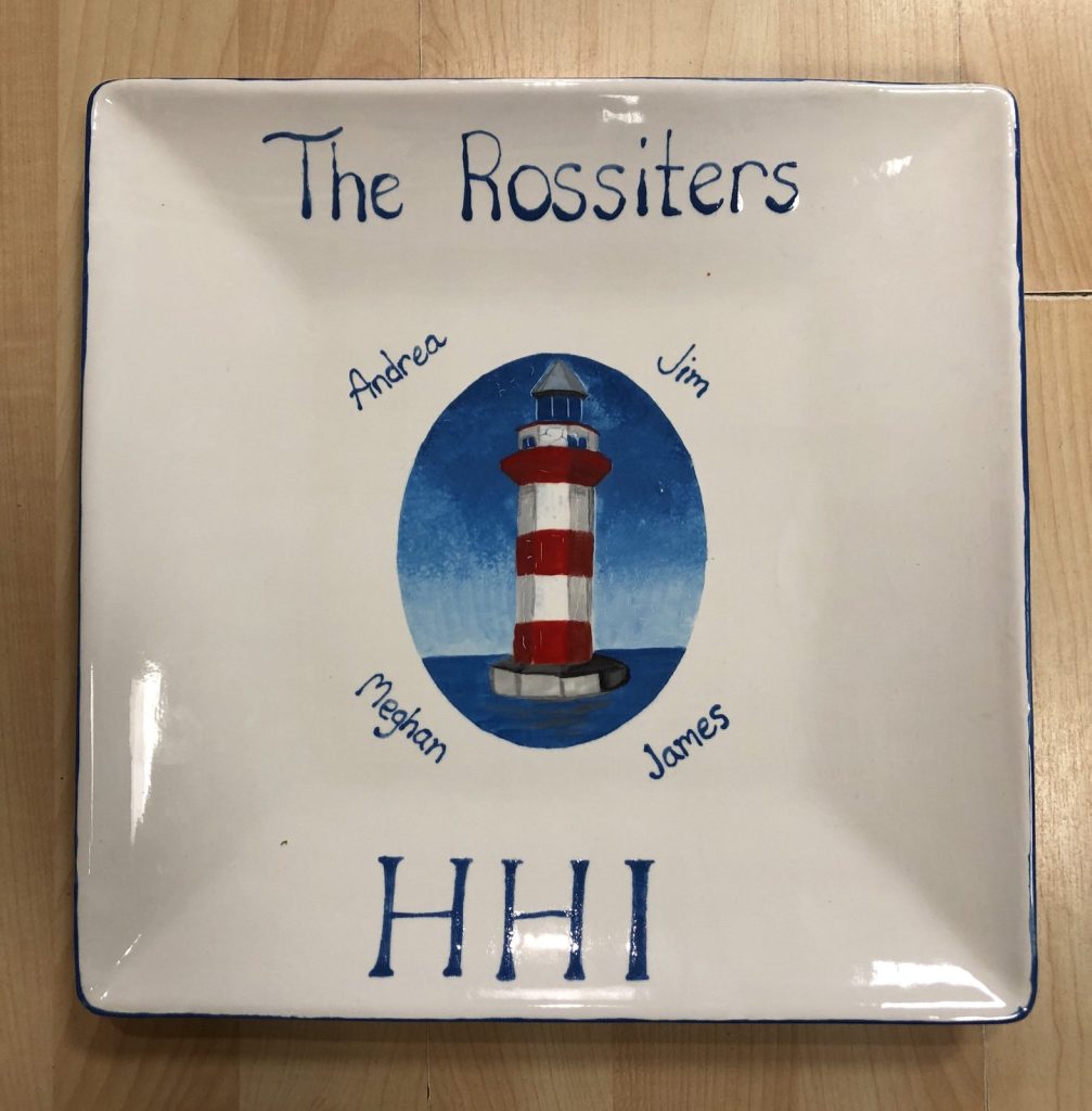 Hand-painted square family platter with a red and white striped lighthouse and HHI lettering