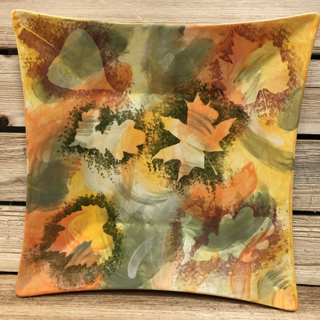 Square hand-painted platter with watercolor autumn leaves in orange, olive and gold