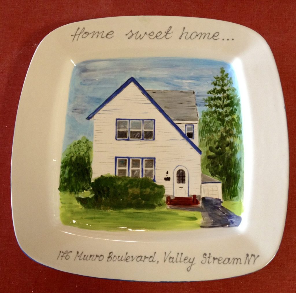 Hand-painted square Home sweet home platter of a white cape house with blue trim
