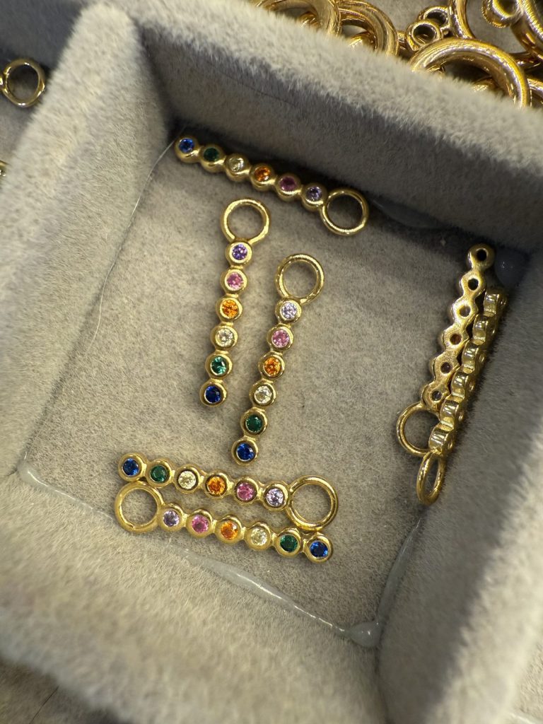 Gold bar charms set with colorful stones