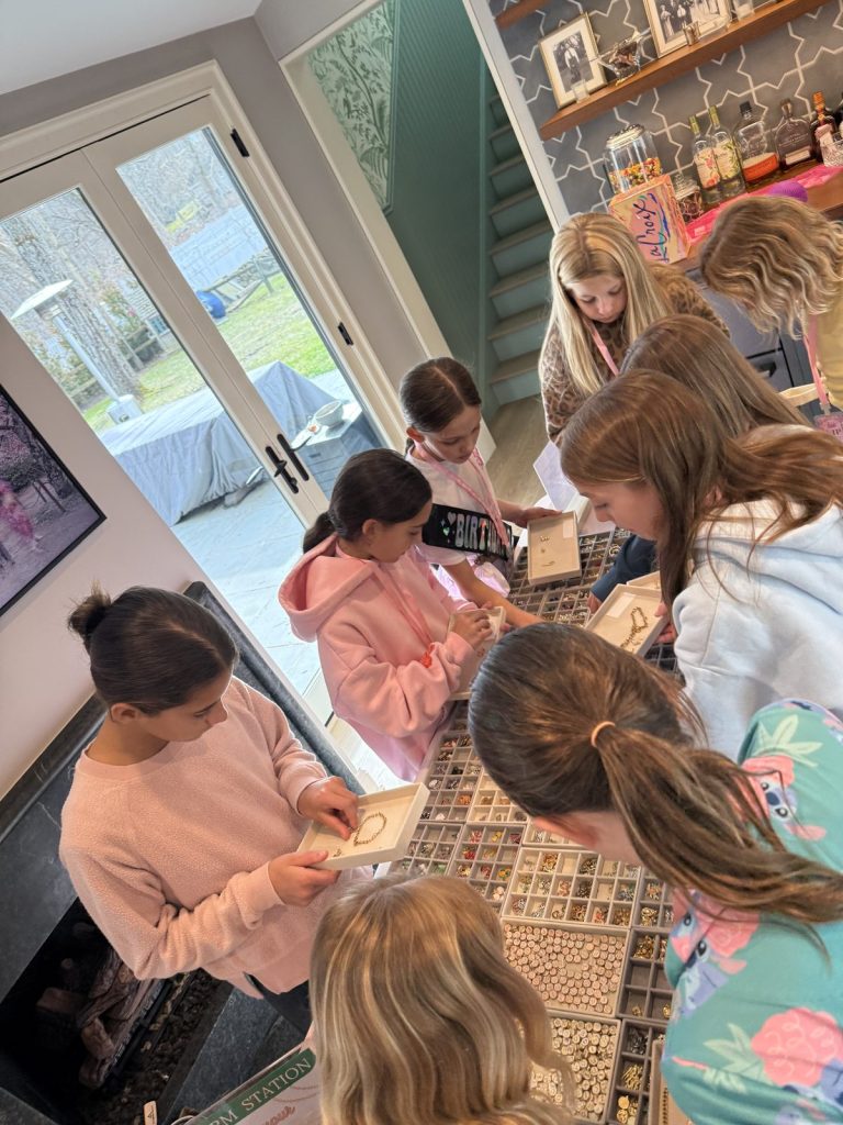 Girls picking charms at a Charm Bar birthday party