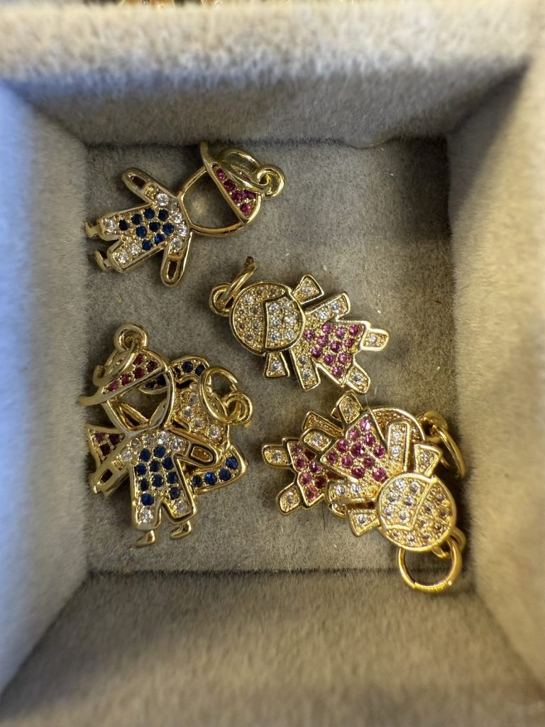 Little boy and girl charms with colored stones