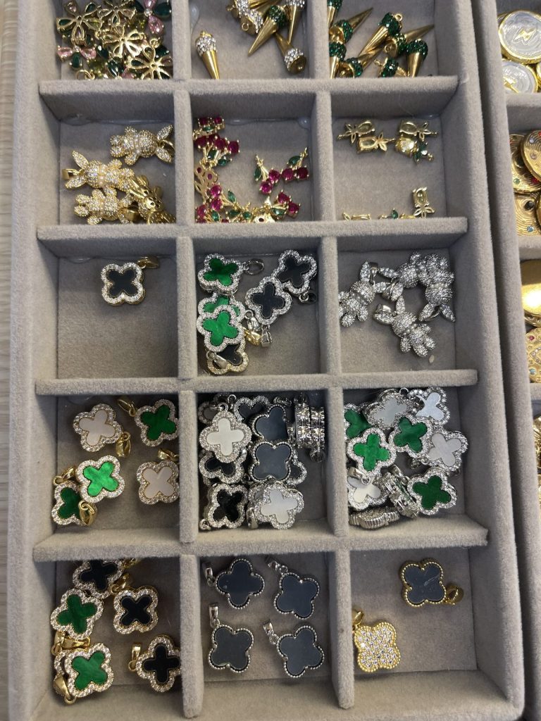 Clover and bow charms