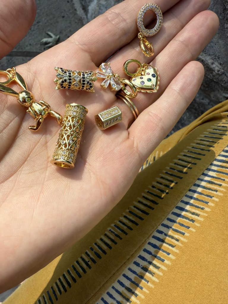 A handful of gold charms