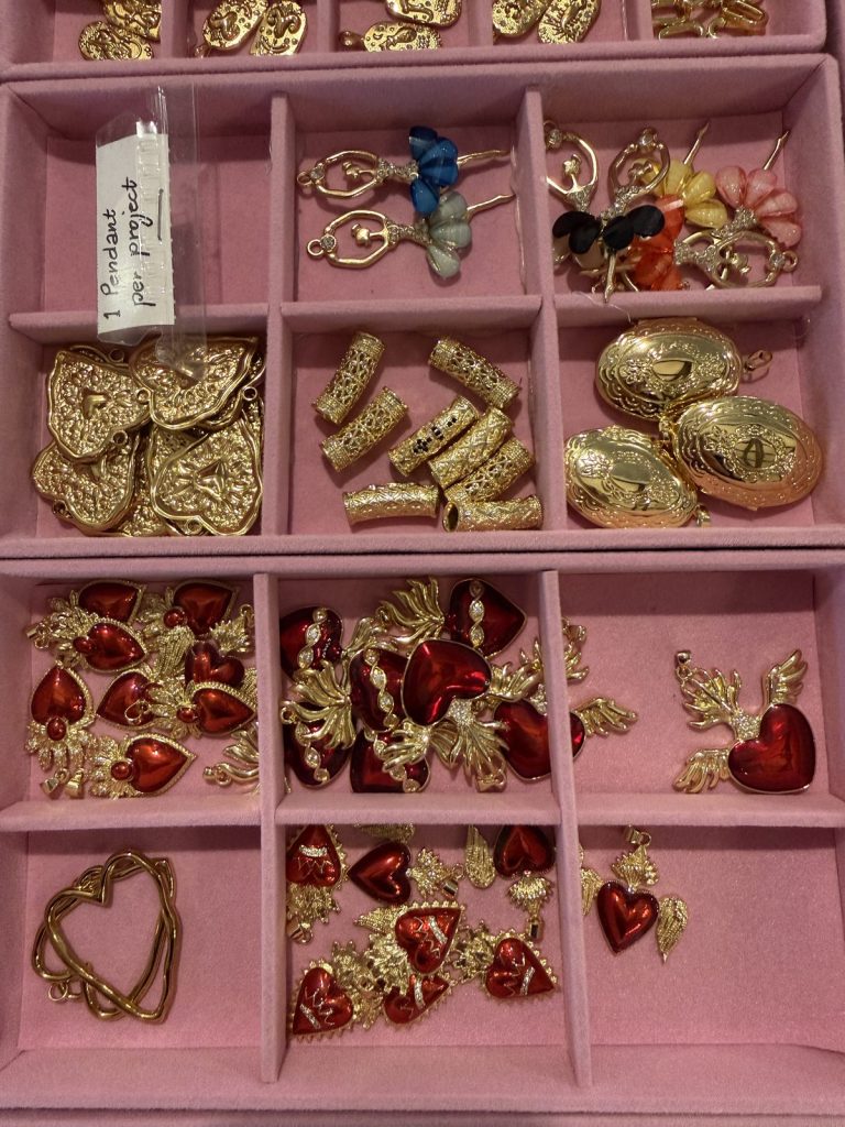 Red heart charms and gold lockets