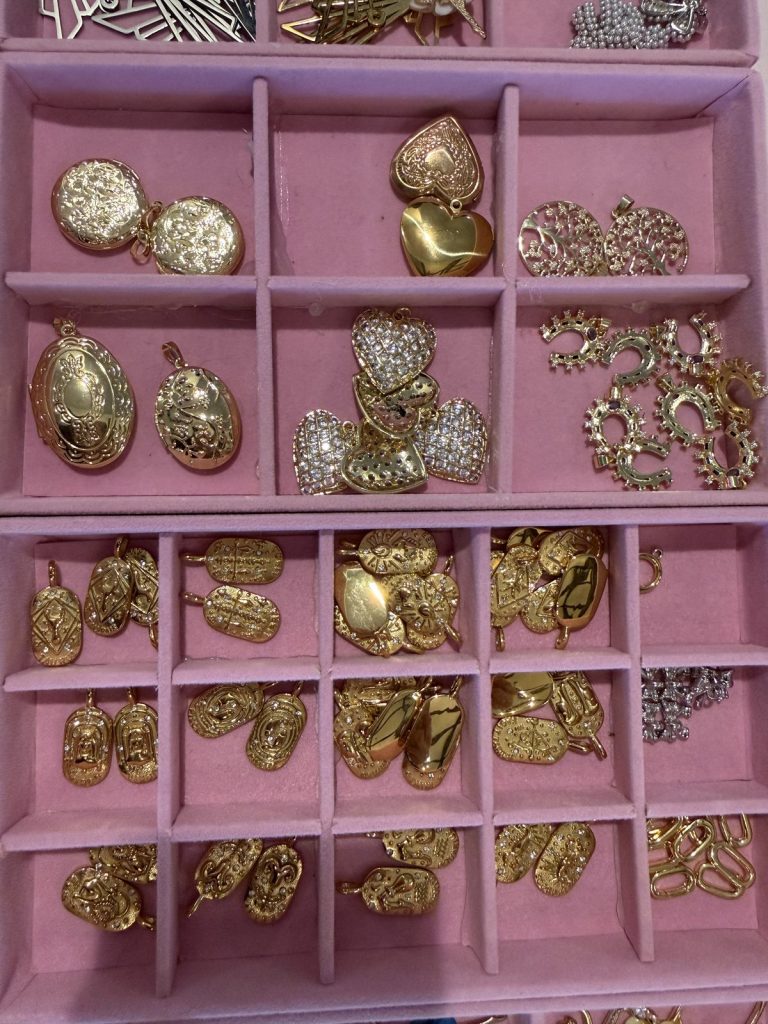 Gold heart and locket charms