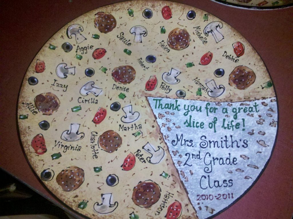 Hand-painted pizza platter with fingerprint toppings and "Thank you for a great slice of life!" from a 2nd grade class