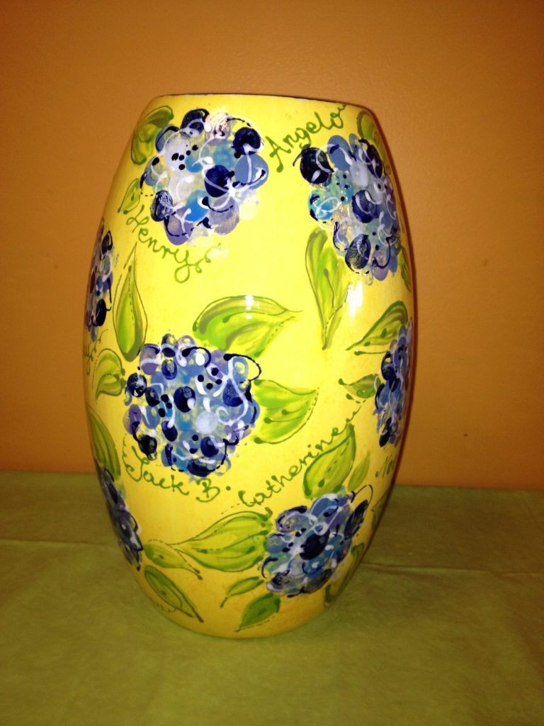 Hand-painted yellow vase with blue fingerprint hydrangeas, green leaves and children's names