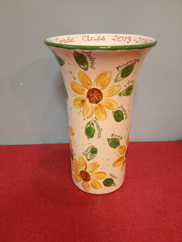Hand-painted flared vase with yellow sunflowers and children's names for a 2013–2014 class