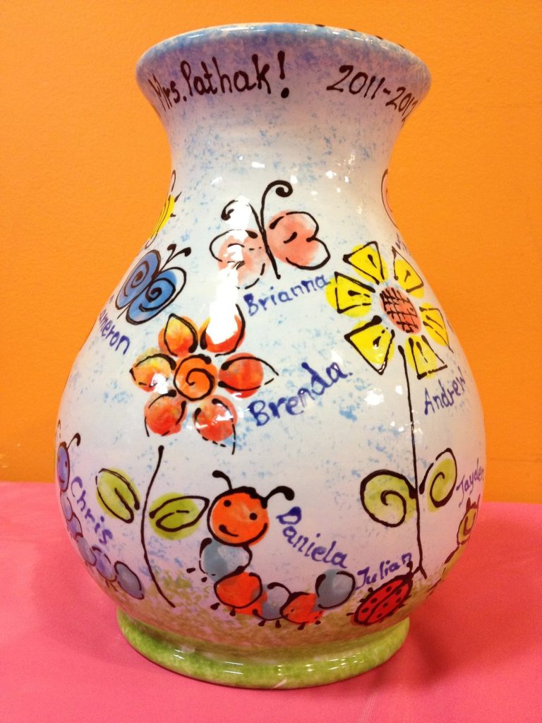 Hand-painted vase with fingerprint flowers, a caterpillar and children's names for a 2011–2012 class