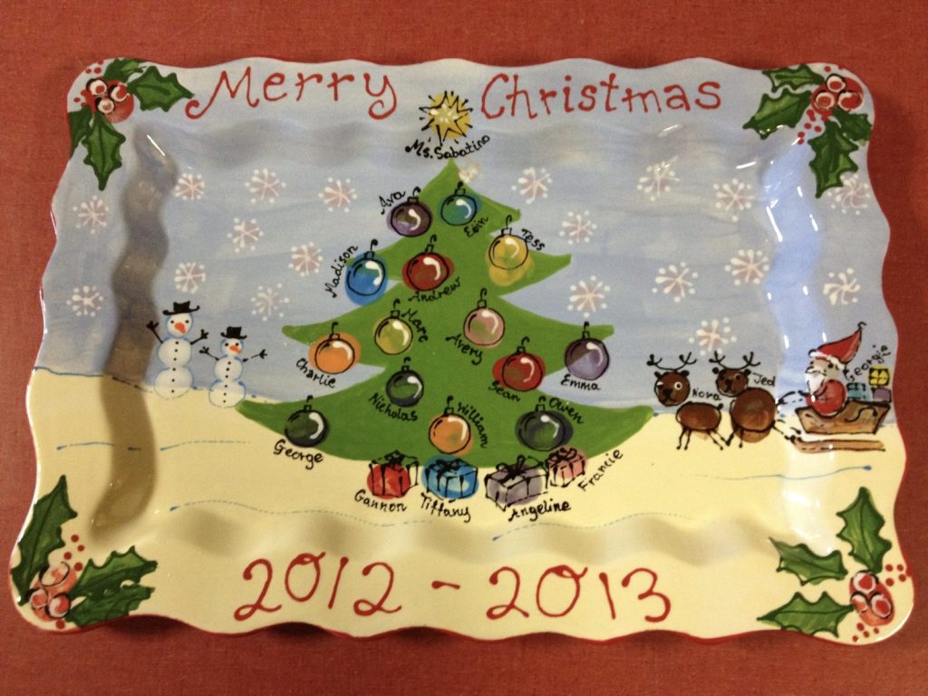 Hand-painted wavy "Merry Christmas" platter with fingerprint ornaments, snowmen and reindeer, 2012–2013