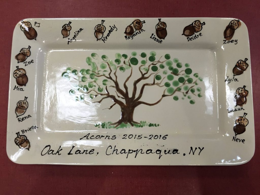 Hand-painted rectangular "Acorns 2015–2016" class platter with a fingerprint tree and acorn border