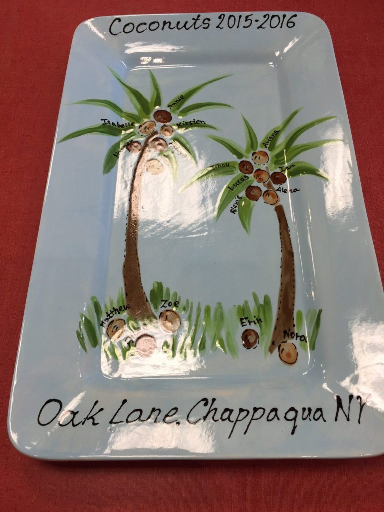 Hand-painted rectangular "Coconuts 2015–2016" class platter with two palm trees and fingerprint coconuts