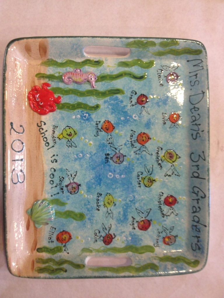 Hand-painted handled tray from 3rd graders, 2013, with fingerprint fish and seaweed in an underwater scene