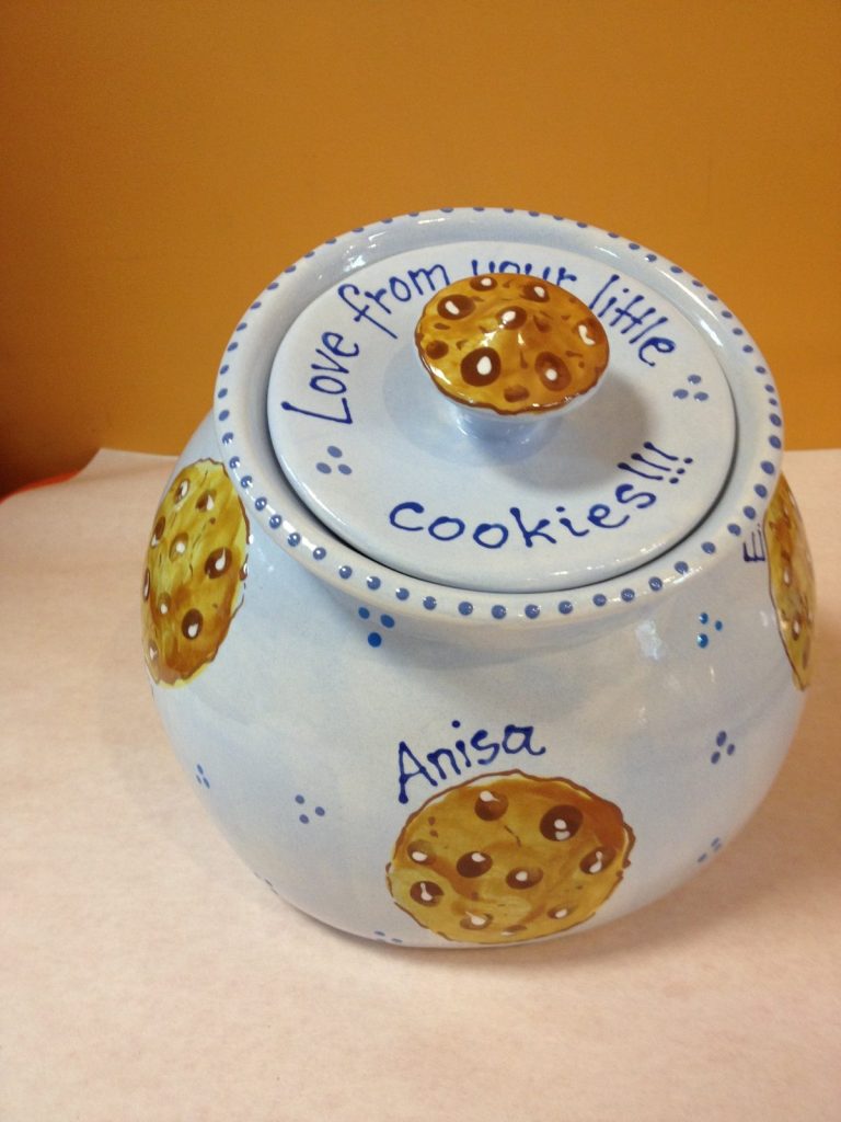 Hand-painted light blue cookie jar with chocolate chip cookies and "Love from your little cookies!!!"