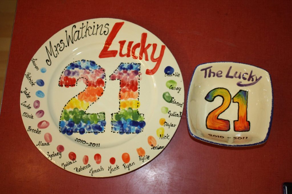 Hand-painted "Lucky 21" platter and matching small dish with rainbow fingerprint numbers
