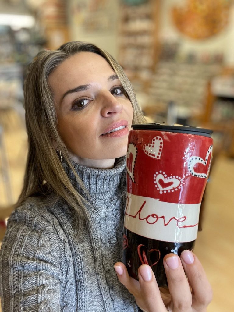 Hand-painted tall red and white mug with doodled hearts and love script across a white band