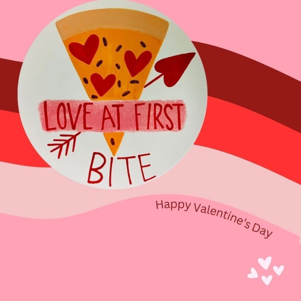 Hand-painted round plate of a pizza slice with hearts and an arrow reading Love at First Bite